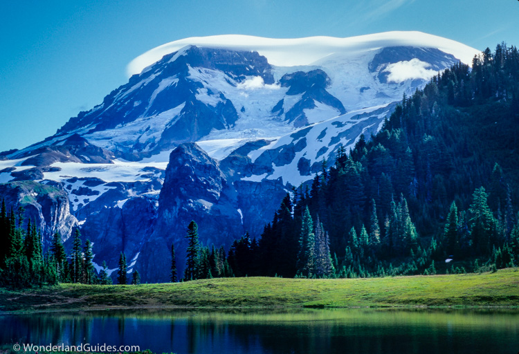 A lenticular cloud above Mount Rainier viewed from Aurora Lake from Klapatche Park on the Wonderland Trail